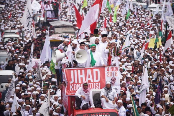 Member of hardline Muslim groups attend a protest against Jakarta's incumbent governor Basuki Tjahaja Purnama.